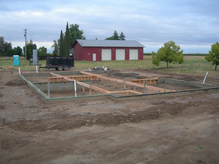 The ground is covered in dirt.