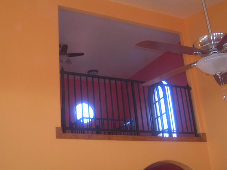 A ceiling fan in a room.