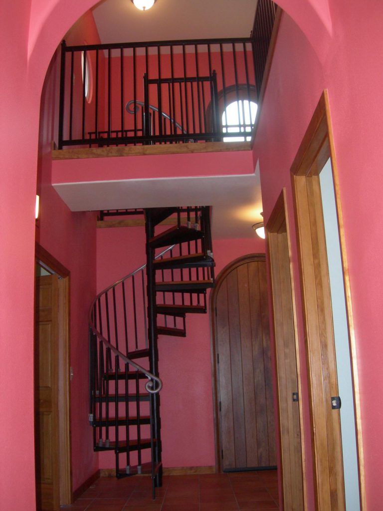 A spiral staircase in a house.