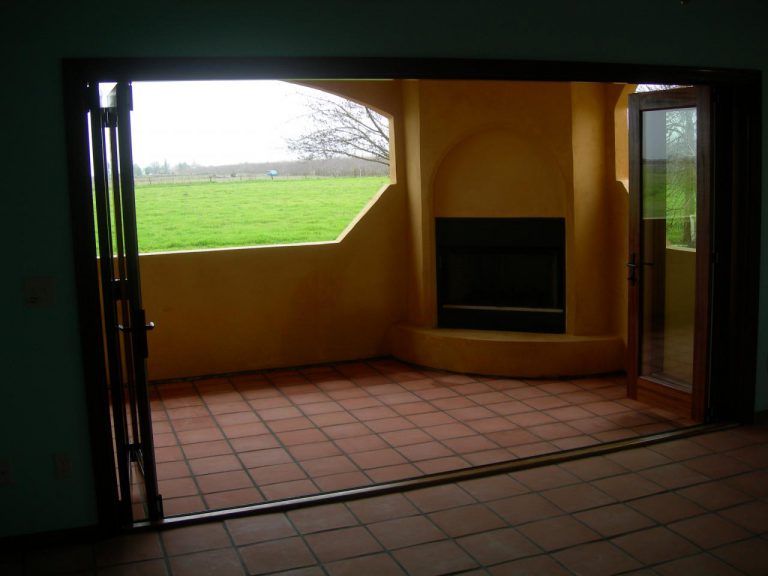 A room with a fireplace.