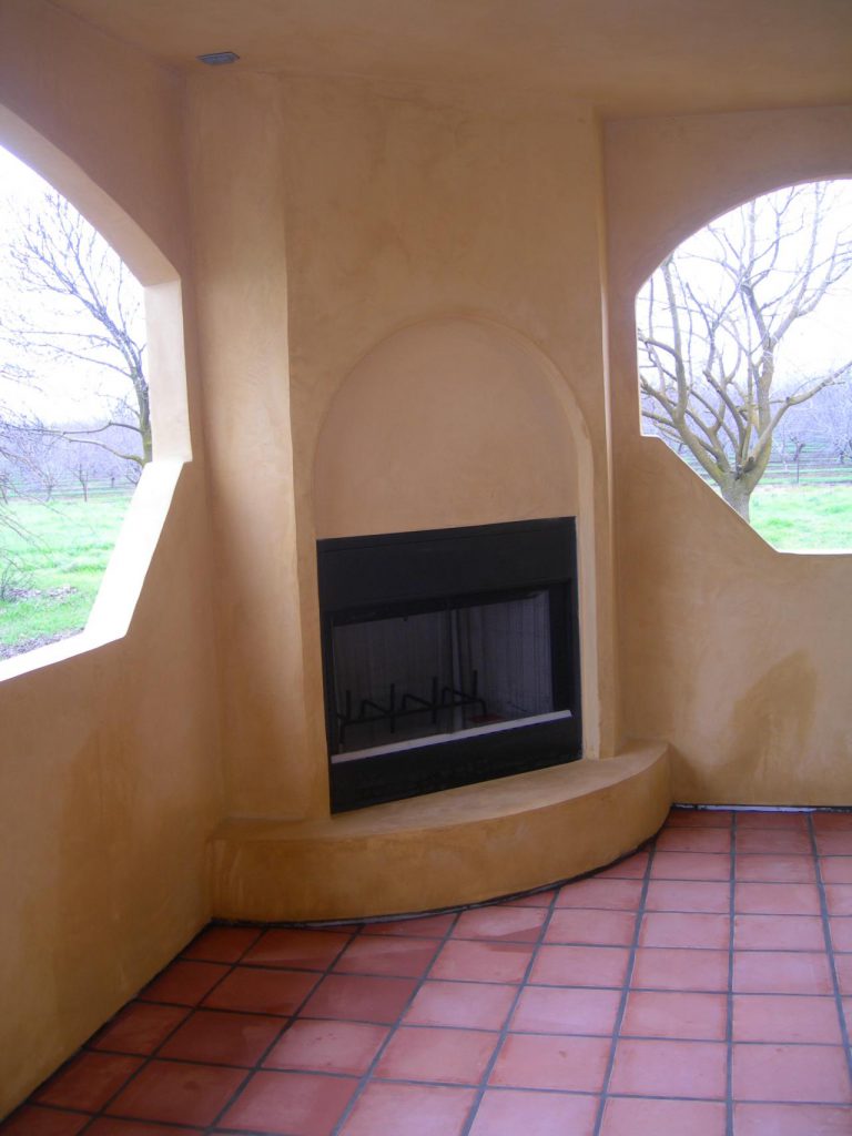 A fireplace in a room.