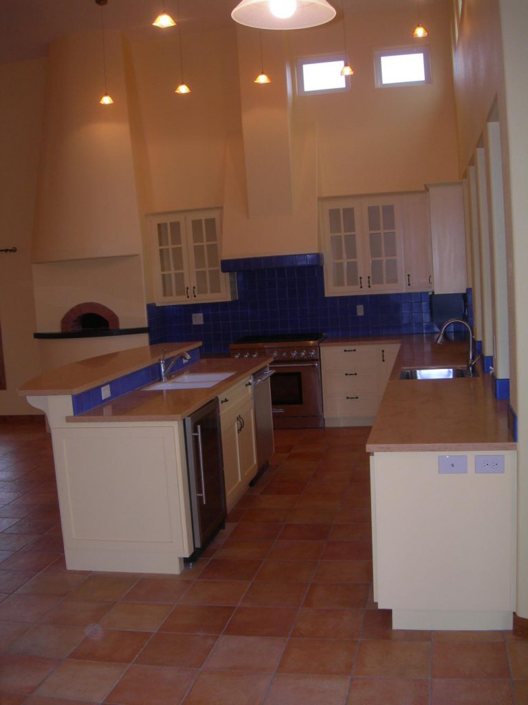 A tiled floor in a kitchen.