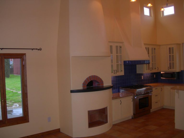 A kitchen with a stove and oven.