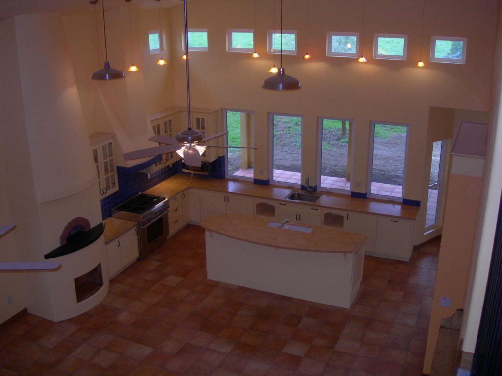 A kitchen with a stove and oven.
