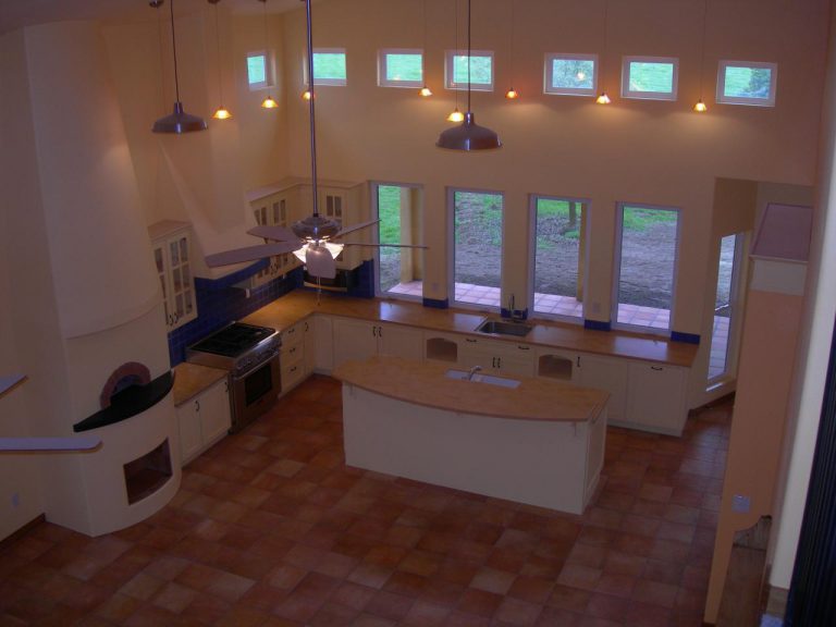 A kitchen with a stove and oven.
